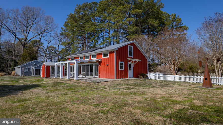Located in the heart of Irvington, this intentionally small home was constructed to be highly energy efficient. With 3 bedrooms and two full baths, the design is both modern and comfortable. The main level living area with 16 ft ceilings features a compact and remodeled kitchen and overlooks a private patio and backyard. The main level also includes a primary ensuite bedroom which adjoins a separate laundry room, a guest bedroom and hall bath and a dining area with access to the back patio. The upper level offers a loft area, huge hall/closet and a bedroom tucked away at the back of the hall. The almost half acre lot offers plenty of room for gardens or play area and the detached she-shed/workshop is a bonus. This property is ideally situated in walking distance to shops, restaurants, the Tides Inn, RRYC and the public boat ramp on Carter’s Creek.