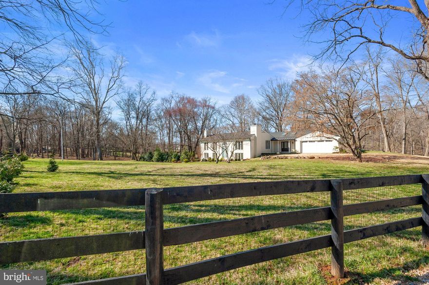 Just minutes East of downtown Middleburg, private setting, beautiful home with well-maintained grounds and your own private pool.  Work from home or a straight shot commute to DC.  Sounds heavenly?...Welcome to Quail Hollow.  Renovated in 2020 this beautiful home is move in ready.  Walk into a large open foyer with views straight out to your private backyard oasis.  The inviting great room has  hardwood flooring, a gorgeous stone fireplace, wet bar with beverage fridge and a wall of windows and doors that lead you out to the inviting rear terrace.  Step up into the formal dining room with custom painted ceiling and continue on to the fully renovated kitchen with three ovens, two sub zero refrigerators,  gorgeous custom cabinets with Limoge  pulls, quartz and marble countertops, a huge island perfect for entertaining, Viking, Sub-Zero and Miele appliances, tons of recessed lighting, a coffee bar, and a Shaws Original sink with Rohl fixtures.  There is also a cozy eating area with a fireplace and built ins. Also on the main level there are  two Powder Rooms (one off the kitchen and one off the foyer) and the primary suite.  The Main level spacious primary suite has a fireplace, three closets that light up when the doors are opened, doors that open to the outside with stunning views of the property, and a new luxury bathroom with marble glass shower, quartz countertops, separate soaking tub and lots of built in cabinetry..  The walk out lower level has 2 bedrooms, an office area, bath with new shower and lights, family room with wood burning fireplace and lots of open storage.  Outside, enjoy time on the terrace, covered patio or or enjoy an evening on the patio with the built in fireplace.  The relaxing in-ground pool  will be enjoyed by family and friends.  The property is fully fenced with black running board and secure pet wiring on the total property, as well as a gate at the entrance. The 4.7 acre property also includes a pergola with full kitchen (grill, sink, cooktop and small frig) and lovely landscaped gardens. There is also a two-bay equipment shed/barn with loft, chicken house and a green house.  The interior and exterior have been freshly painted in the past month and the entire house was been re-wired in 2021.