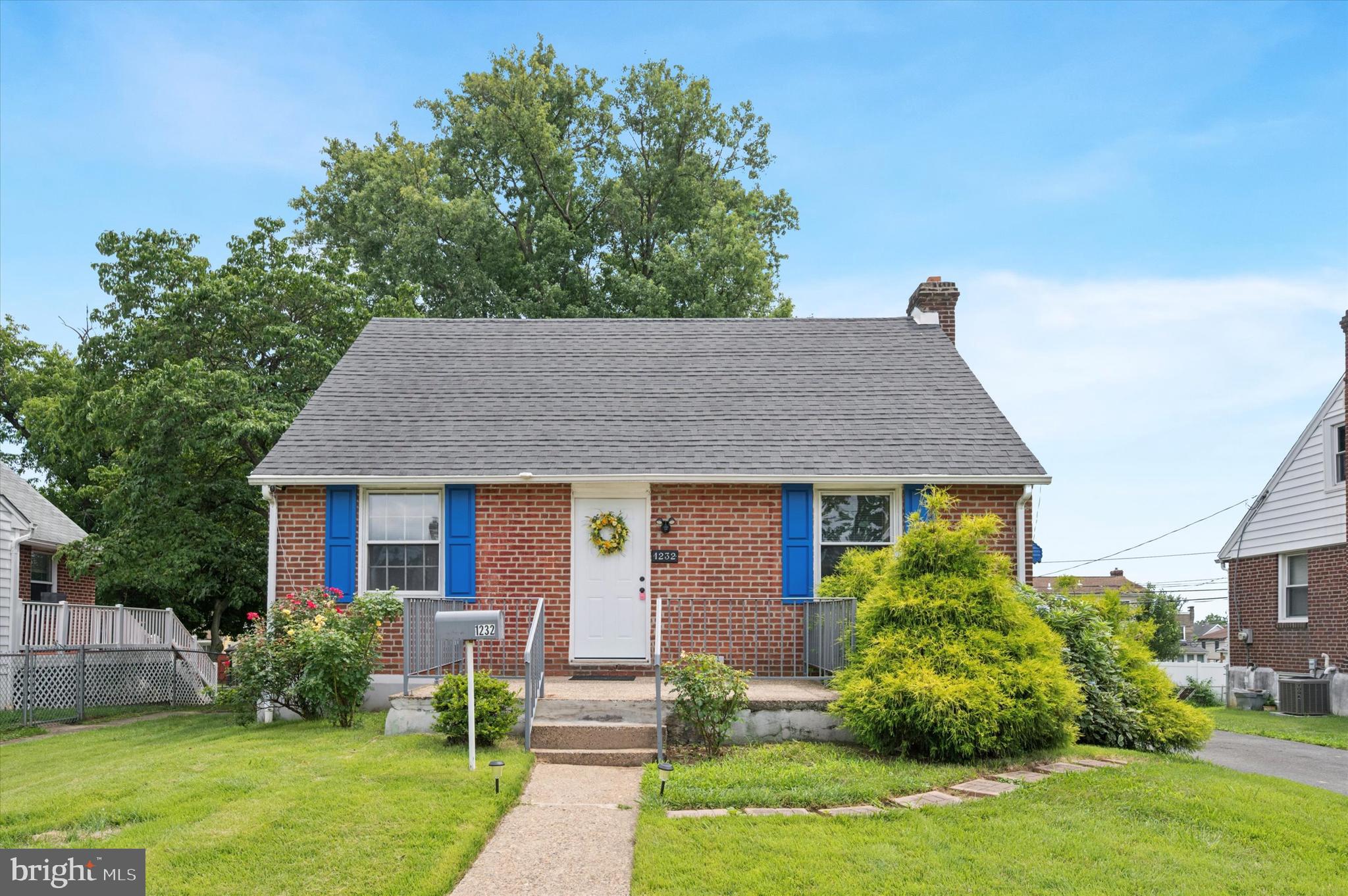 Now for sale in Woodlyn! This adorable 3 bed, 1 bath Cape Cod home has charming curb appeal but offers more space inside than you may think upon first glance! You'll enter into the living area with ceiling fan, which leads to the eat-in kitchen with room for a dining table. The updated kitchen features white shaker cabinetry, granite countertops, tiled backsplash, and adjacent pantry room that includes the refrigerator. This level also offers 2 carpeted bedrooms, hall closets, and spacious renovated bathroom with tub shower. Head upstairs to find the third bedroom with ceiling fan, additional closet space, and attic storage. There's also a partially finished walkout basement with stone fireplace for more usable space, plus the utility and laundry area. Don't miss the plentiful outdoor amenities either! There's a front porch and a rear deck with access to the sunroom with ceiling fan and skylight - a fabulous place to enjoy in all weather! The fenced yard space includes an additional patio, plus a large garage shed for lots of storage. Driveway parking. If you're home shopping in the area, this home is a must-see! Schedule a showing today and make your offer before it's sold!