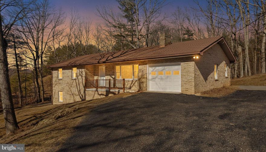 Charming brick home built in 1983, beautifully updated and move-in ready. This 3-bedroom, 2-bath property sits on 0.92 wooded acres in a peaceful, elevated setting.
Recent renovations have given the home a fresh, modern feel while maintaining its solid construction and character. A spacious unfinished basement with fireplace offers incredible potential for additional living space, recreation, or storage.
Enjoy the quiet surroundings from the new back porch and appreciate the major system updates already completed. If you're looking for privacy, updates, and room to grow — this one checks the boxes.