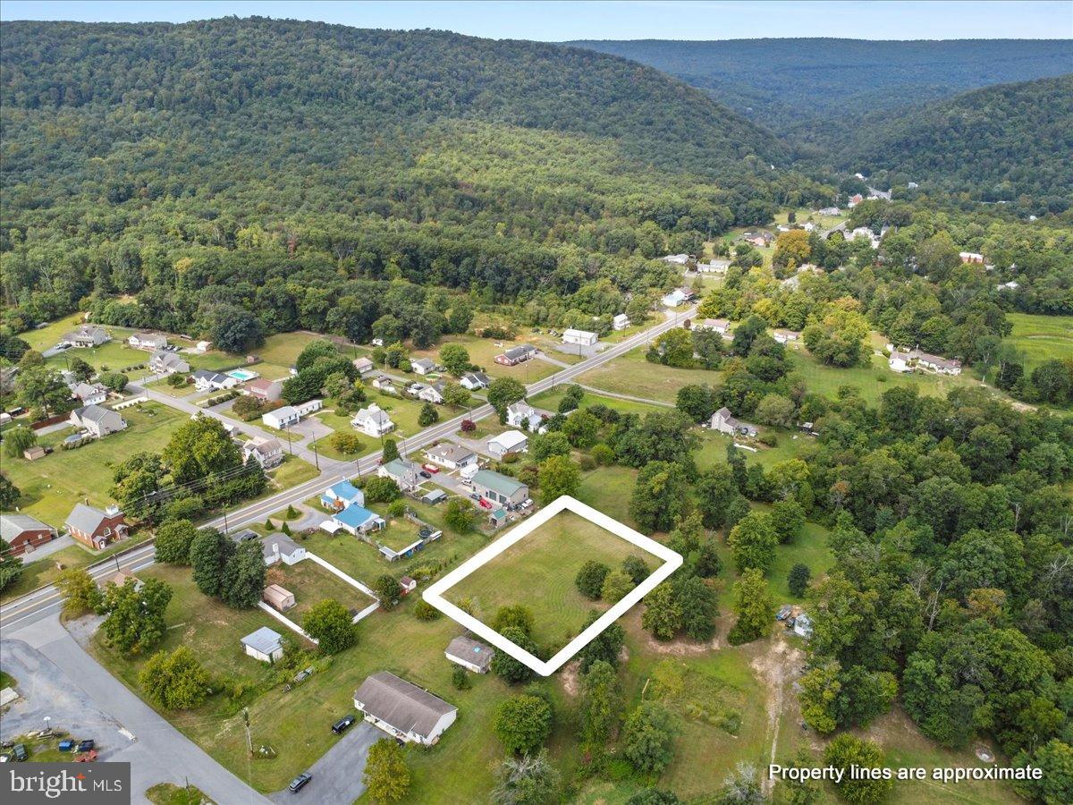This prime 0.86-acre cleared lot offers a blank canvas for your dream home or investment opportunity. With no existing structures, you have the freedom to design your space to suit your lifestyle. Public sewer hookup is available. Private well would need to be installed. The lot has not been perc tested. The cleared land ensures easy access and development potential, while its generous size allows for various architectural styles and outdoor amenities. Conveniently located near essential services and recreational options. Don't miss the chance to create your vision in this desirable location!