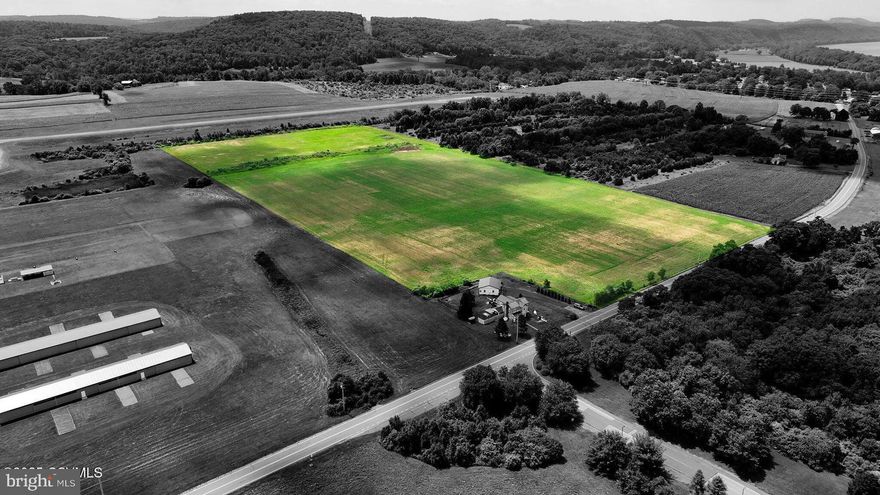 Rare Development Opportunity - Riverside Borough Take advantage of this exceptional opportunity in Riverside Borough. Zoned (RM) Medium Density Residential, this level parcel is ideally situated adjacent to the Danville airport and just minutes from downtown Danville and its amenities. This versatile site supports a variety of permitted uses including single-family homes, multi-family residences, and townhouses—making it ideal for residential development. Zoning map and permitted use details are available in the listing documents