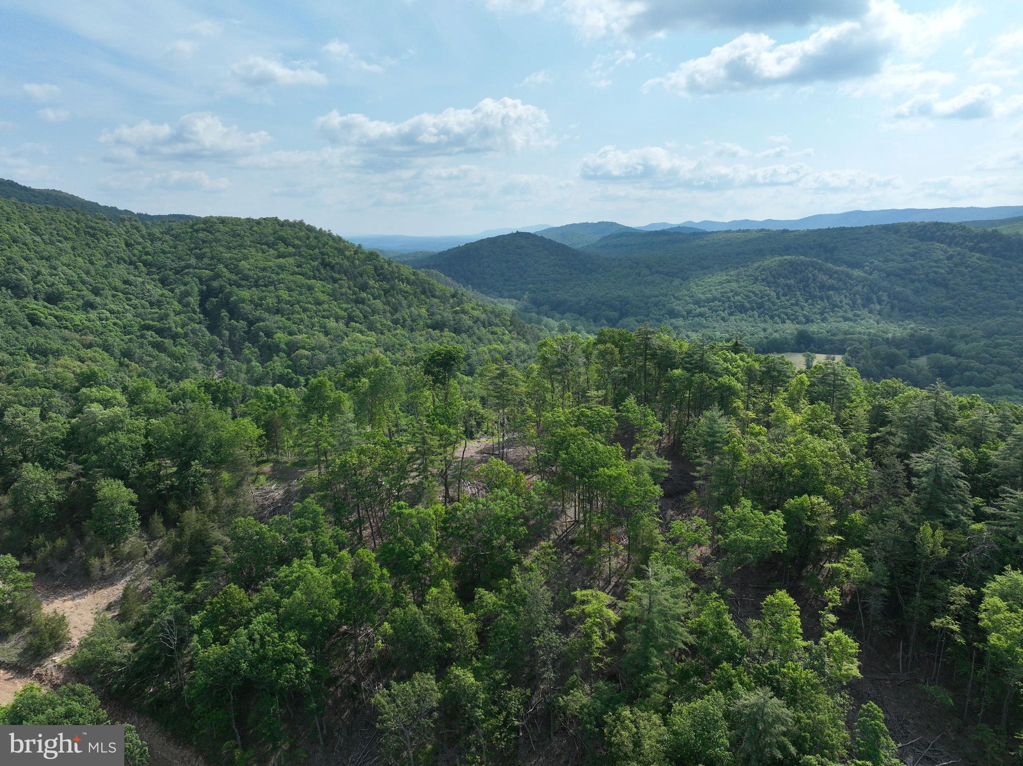 NONE UNRESTRICTED - Land