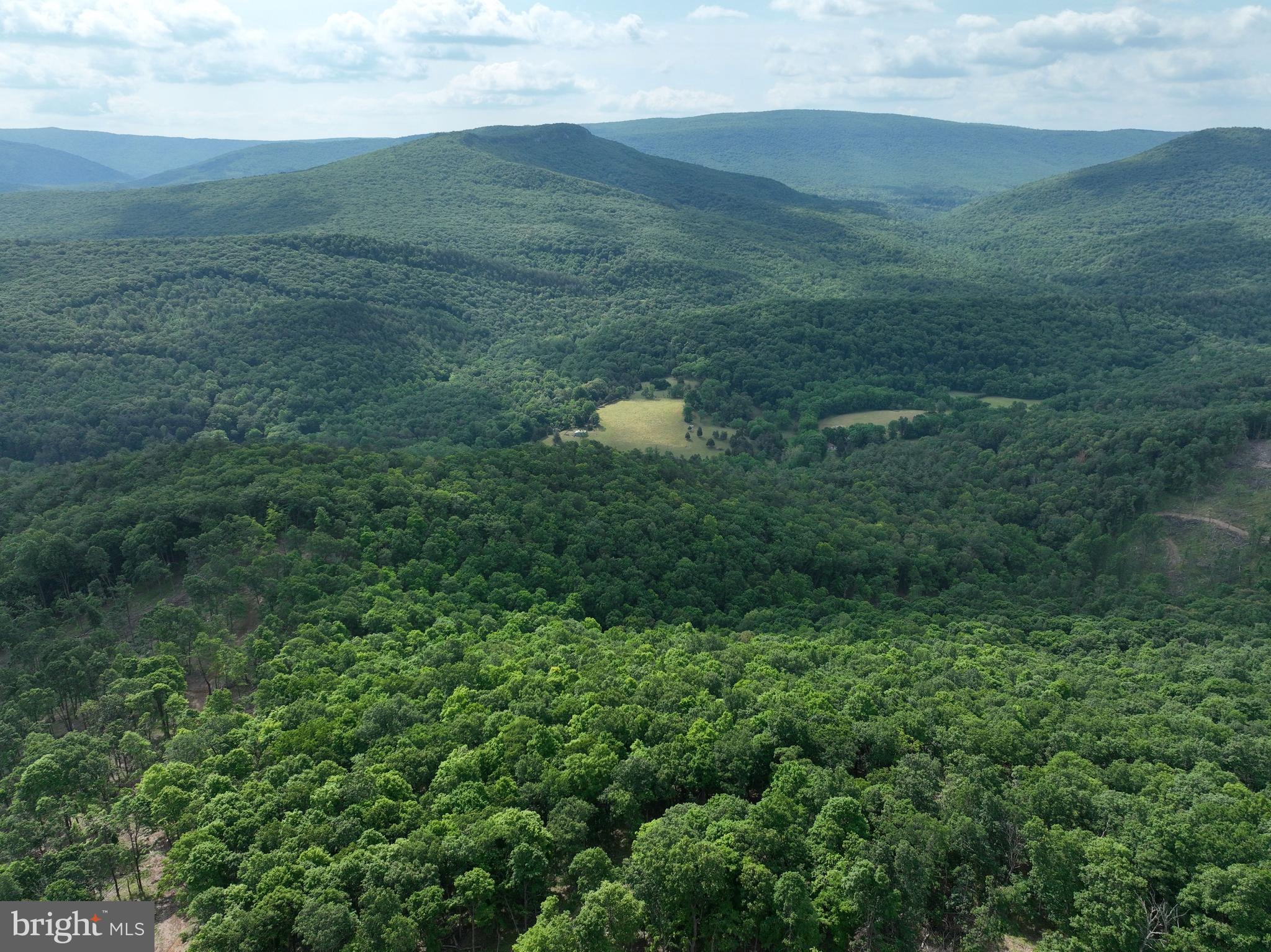 NONE UNRESTRICTED - Land