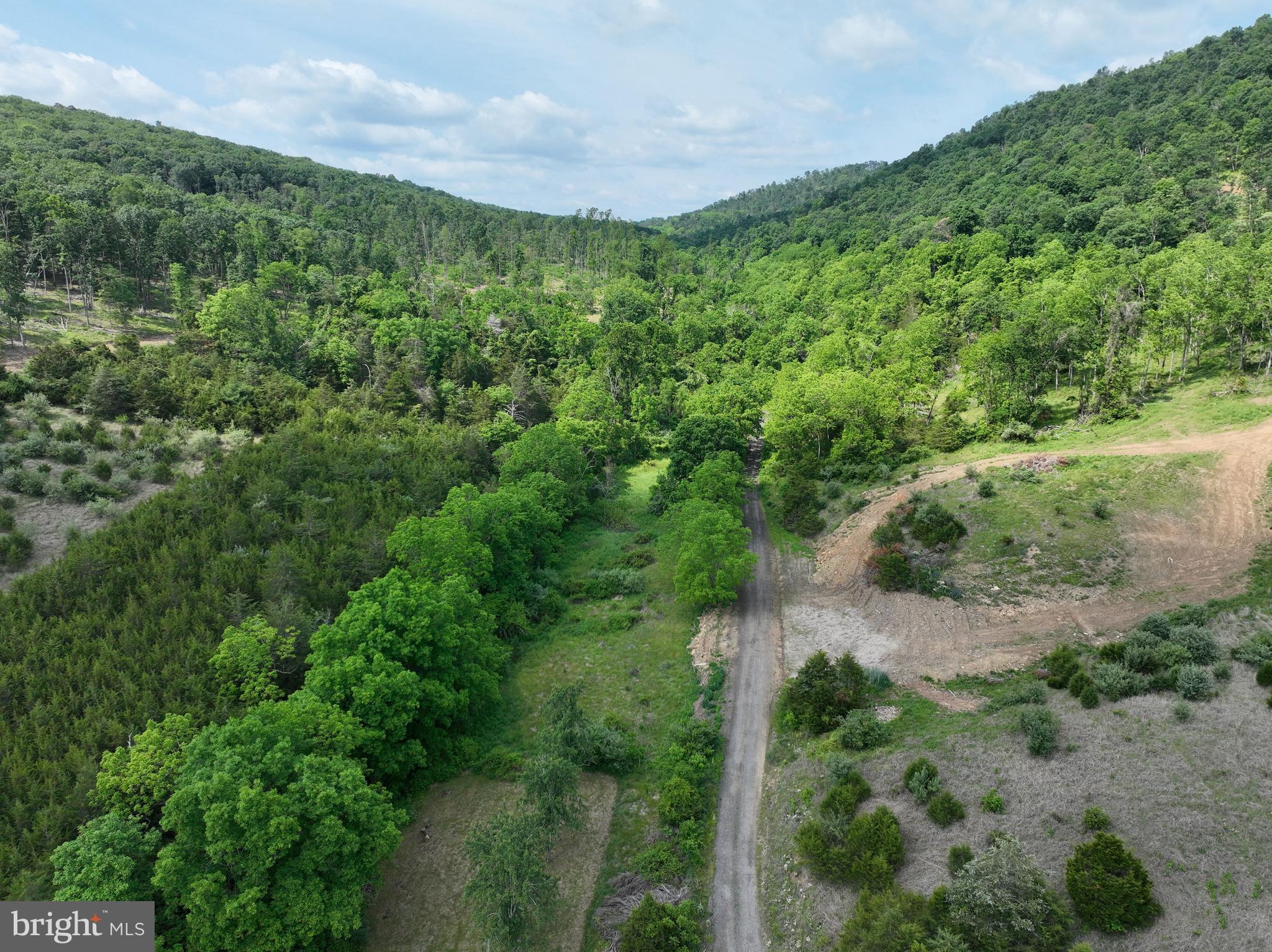 NONE UNRESTRICTED - Land