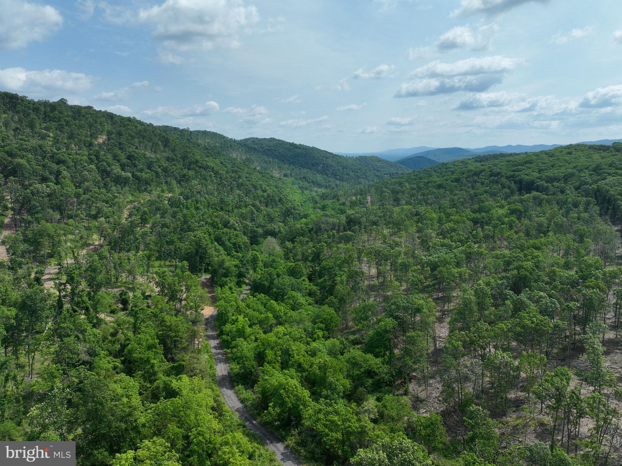 NONE UNRESTRICTED - Land