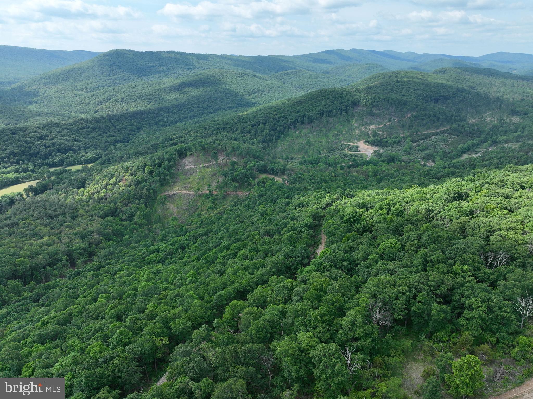 NONE UNRESTRICTED - Land