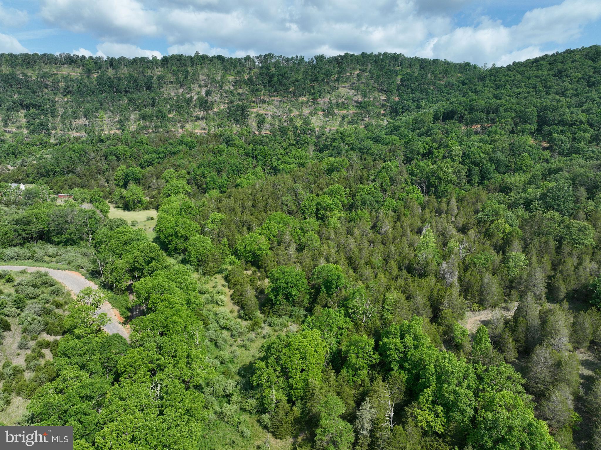 NONE UNRESTRICTED - Land