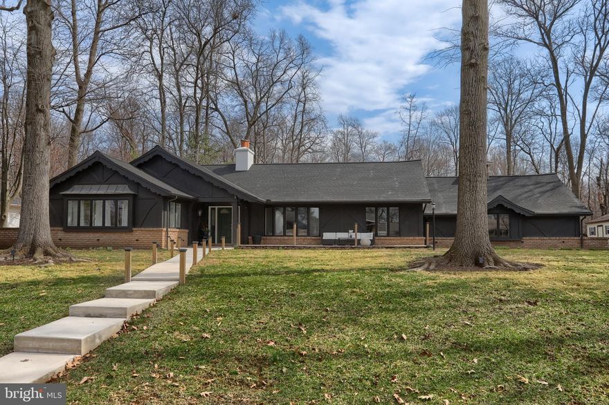 ABSOLUTELY STUNNING HOME! Nestled on a 1.15 acre double wooded lot near Ebenezer Lake; this 3 bed, 3 bath beauty has approx. 3,300 square feet of living space to stretch out in.  With Plenty of room in the spacious back yard for that inground pool you've been dreaming about.  This beautiful home has been updated inside and out including mechanicals and roof!  The current owner has all but doubled the living space during his ownership.  The finished lower level is a knockout!
As you enter the front door of this lovely home, you will notice the luxury vinyl plank flooring throughout. Step to the right into the comfortable living room with a custom feature wall including built-ins. There is also a large wood burning fireplace in this room  and a  bay window to let in lots of natural light.  The living room is open to the dining room, which also has it's own beautiful custom feature wall.  Continuing on to the large kitchen with granite countertops, a beautiful backsplash, an oversized island with lots of seating and a breakfast area at the far end with another stone fireplace and beams in the ceiling for added character.  Just off the kitchen is the large sun room with a vaulted ceiling, some great brick accents and  a great view of the oversized back yard.  A great place to sit and sip your morning coffee and watch the sunrise. 
 Also on this floor is the primary bedroom which has its own on-suite bathroom  with dual sinks and a walk-in shower.  The second bedroom on this floor has been turned into a luxurious walk-in closet/dressing room for the primary.  But could easily be turned back into an extra bedroom.  There is another quest bedroom and beautiful guest bath on this floor.  
 Walk downstairs and you will find an oversized family room with a fireplace and more custom build-ins.  There is an entertainment kitchen on this level, a third full bathroom including a sauna, and another bedroom.  There would also be room for an office area or your workout equipment as well.  This home has an oversized garage (27' x 26') for lots of storage.  Outside you can enjoy the large front and back decks and the new patio just off of the sunroom.  Lots of outdoor lighting make this a cozy spot in the evening.  You must see this house to appreciate it.  There is attention to detail at every turn!  It goes active on Saturday the 29th.  reserve your showing now!