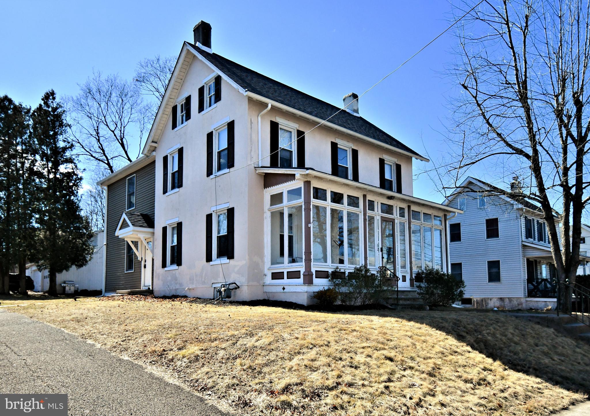 Beautiful 4br 2.5 bath single colonial with 2 car detached garage with loft in Pennridge School District. Master bedroom with remodeled master bath and walk-in closet plus three additional spacious bedrooms on the second floor brand new carpeting. After entering through the enclosed front porch there is a large living room and dining room with hardwood floors. Newer kitchen and open floor plan in the back of the house which includes a family room and eating area and brand new garbage disposal. Granite counter tops and plenty of cabinet space. Renovated laundry room. Attic with walk up stairs. Brand new roof and hot water heater. Deceivingly large home in Sellersville Boro.