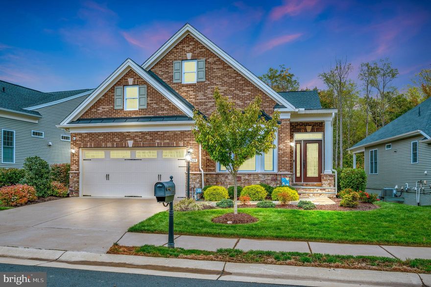 Seriously honey, stop the car on this one! Imagine being close to all you dream of such as shopping, restaurants, medical, I95, commuter lots, farmer's market, winery, Battlefield Country Store, the mall and more!  Leave the hustle and bustle behind and turn into the beautifully landscaped entrance and gated community knowns leading to Regency of Chancellorsville.  Go past the clubhouse where you will enjoy social activities, workout facilities, gaming, indoor/outdoor pool and more.  Turn right on Burbank and pull into the two car garage that awaits you.  The home is beautifully situated on a premium private lot.  Your rear neighbors are trees, birds and other nature's delights.  Enjoy the orientation of your home which will allow countless hours of cool shade in the evenings on either of your patios, and do not miss the glorious sunsets to your west!  Professional landscaping surrounds the entire home!

Inside this home, your breath will be taken away by all the exceptional improvements/upgrades and attention to detail.  The main level affords you a spacious main bedroom and bath, office with 8' french doors, guest bedroom with shiplap wall, full hall bath with walk-in shower, family room with fireplace, dining room, eat-in gourmet kitchen and main level laundry.  The 82" tv in the family room conveys! Cozy up to the fireplace while others may be cooking in the kitchen.  The open floor plan invites engagement.  When you just can't get enough outdoor living, choose between the glorious sunroom with 8ft french doors or the outside TREX deck! Flagstone walkways invite you outdoors!

There is plenty more space for entertaining and getting away from it all in the spacious finished walk-out basement.  There you will find a gorgeous staircase lined with shiplap detail that leads into not one but two family/gathering rooms.  Use one for TV/reading or a getaway and enjoy the other for gaming or entertaining.  Large enough to host a huge second table for meal gatherings and more.  You will also find a third large bedroom as well as a third oversize full bathroom.  But that is not all!  

Everyone needs sufficient storage and this basement has two unfinished areas for just that.  One has all the extras such as pegboard, organizers and 2 steel cabinets (which convey) for the hobbyist or wood crafter!  And there is also a lower level walk out patio to your fenced back yard!

The bells and whistles are almost too numerous to mention but include:  Sentricon sytem, CAT 6 internet on both levels, Central vac for both floors, UV air purifier, whole house water filter, leaf filters, motorized shade for slider, pull-out shelving in bathroom cabinets, cabinets in garage, refrigerator in garage, exterior cameras (4), shiplap, fencing, custom painting, premium lot, professional landscaping surrounding the house, expanded basement package, luxury main bath package, upgraded hot water heater, gas dryer and washer that convey, beautiful hardwood flooring throughout, security system and more.

What are you waiting for? This move in dream home in sought after Regency can be yours before the holidays!  What a Holiday gift!