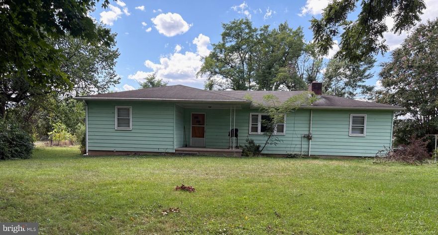 Beautiful level lot with large open space in front and back of house for play or relaxation.  Screened porch and front covered porch to enjoy the outdoor views. Four bedroom 2 bath home on .83 acres.  Brand new HVAC system.  Kitchen, separate dining area and large living area.  Full unfinished basement for storage.  Outdoor 10 X 12 storage building.  Centrally located in Moorefield conveniently located near to shopping, schools, dining and medical services.  Schedule an appointment today.  Won't last long.