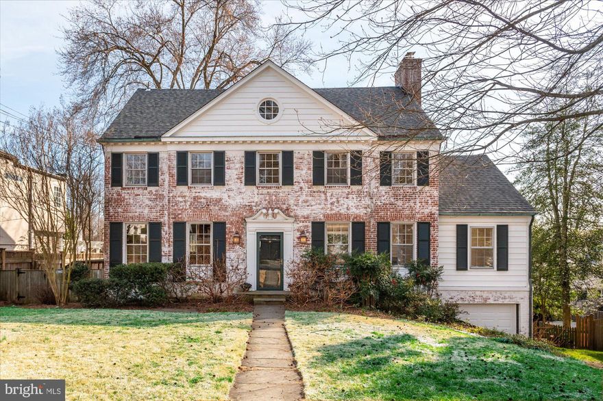 This story-book whitewashed brick colonial located in Westmoreland Hills has been expanded and updated throughout the years, featuring six bedrooms and four and a half bathrooms. The exquisite exterior complements the interior, which features hardwood floors, oversized windows, crown moldings, and built-ins. The main level boasts a spacious floor plan, including a stunning formal living room with a wood-burning fireplace, a family room with built-in bookcases and a sliding glass door leading to the back deck, and an elegant formal dining room. The gourmet eat-in kitchen features ample cabinetry, granite countertops, stainless steel appliances, and a breakfast nook with access to a side patio (making it the perfect spot for a grill). Completing this level is a powder room and welcoming foyer. 

Upstairs, find four bedrooms and two full bathrooms, including the primary suite featuring a dressing room with dual closets, ample storage space, and an ensuite bathroom. The third level offers two additional bedrooms and a full bathroom. The walk-out lower level includes a recreation room with a wood-burning fireplace, a built-in wet bar, a bonus room (that can be a potential additional bedroom), a full bathroom, laundry, and a storage room with a workbench and access to the attached garage. The fenced-in rear exterior is an extension of the home, with beautiful landscaping and multiple spaces for outdoor entertaining, including a deck off the family room and an expansive patio and yard off the lower level. The home is just steps from Westmoreland Hills Park, Little Falls and Capital Crescent Trails. Starbucks, Millie’s, and the Spring Valley Shopping Center are just down the road! Enjoy living just a quick drive to downtown DC, Bethesda, or Chevy Chase.

See owner upgrade list in documents.