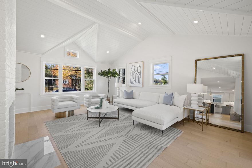 Presenting an exquisite modern-farmhouse chic development by William Andrew Homes! This single-family home harmoniously combines elegance, comfort, and charm throughout its five bedrooms and three and a half bathrooms, and an array of premium features that redefine luxury living.

Inside, you’ll be captivated by the open concept layout, which seamlessly blends style and functionality. The heart of the home showcases a magnificent double-sided gas log fireplace, providing warmth and charm to both the living room, dining area and the gourmet kitchen.

The kitchen is a chef's haven, boasting tailor-made cabinetry, a stylish backsplash, a stainless steel farmhouse sink, a wine fridge, and state-of-the-art Thermador appliances that will ignite culinary inspiration. It includes an expansive kitchen island with a stunning waterfall quartz countertop and bar seating for dining and socializing. Whether you're a novice in the kitchen or a seasoned chef, this culinary space is sure to become the centerpiece of your gastronomic endeavors.

The primary bedroom, situated upstairs, offers custom woodwork, a large walk-in closet and an ensuite bath with a luxurious double vanity. Moreover, the property includes an upstairs washer/dryer closet equipped with a folding counter for added convenience.

Completing the picture are the front and rear Trex decks and energy-efficient windows. Custom lighting fixtures found throughout the space further enhance its appeal, while the abundant natural light streaming in contributes to the welcoming ambiance of every room.

Outside, this property offers a generous porte cochère for your convenience, keeping your vehicles sheltered and secure. The backyard is a true oasis, fully fenced in, ideal for both entertaining and children's play. Imagine hosting barbecues, gatherings, or simply enjoying the tranquility of your private outdoor space. Located close to I-395, Shops, Restaurants,Trails and Recreation Centers.

This home is the epitome of contemporary living and elegance. It combines functionality, style, and comfort to create a perfect haven for you and your family. Don't miss the opportunity to make it yours!