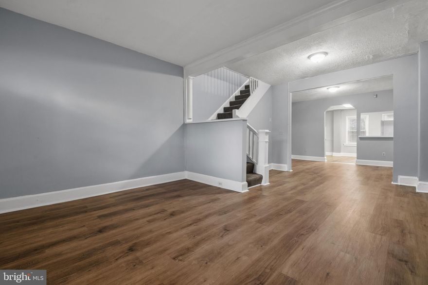 Check out this move-in-ready, all-brick beauty! This home offers a spacious & open main level, an oversized kitchen with access to the back porch and fenced backyard, and soaring 9'+ ceilings. Upstairs, you'll find three generous bedrooms and a full, tiled bathroom. The full basement includes a second bathroom, a rec room, and a bonus room. Conveniently located near Johns Hopkins, downtown Baltimore, and major commuter routes, this home is ideal for homeowners and investors alike. Don’t miss out on this incredible opportunity-schedule your tour today!