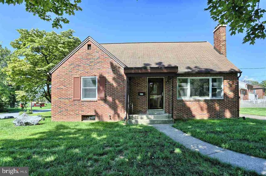 This is a terrific home. All brick, 4 bedroom home on a quiet street on a large corner lot.  Beautiful updated kitchen with stainless steel appliances (remain) and granite counters, original hardwood in most of the home, new windows and doors, most walls and moldings have been replaced. This home has the charm and character of old but the convenience and appeal of new. Finished room in lower-level and covered patio for entertaining. Walk to school and ballfields.