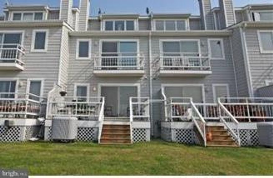 Waterfront Sunsets and waterviews from front and back of this well kept townhouse next to the Narrows.  New carpet, upgraded kitchen, silestone counters with glass backsplash and hardwood floors. This is not a 55 and over community.  Great amenities include pool, clubhouse, tennis, marinas and more.  60 foot slip available right out of your back sliders.  Welcome home and vacation year round.