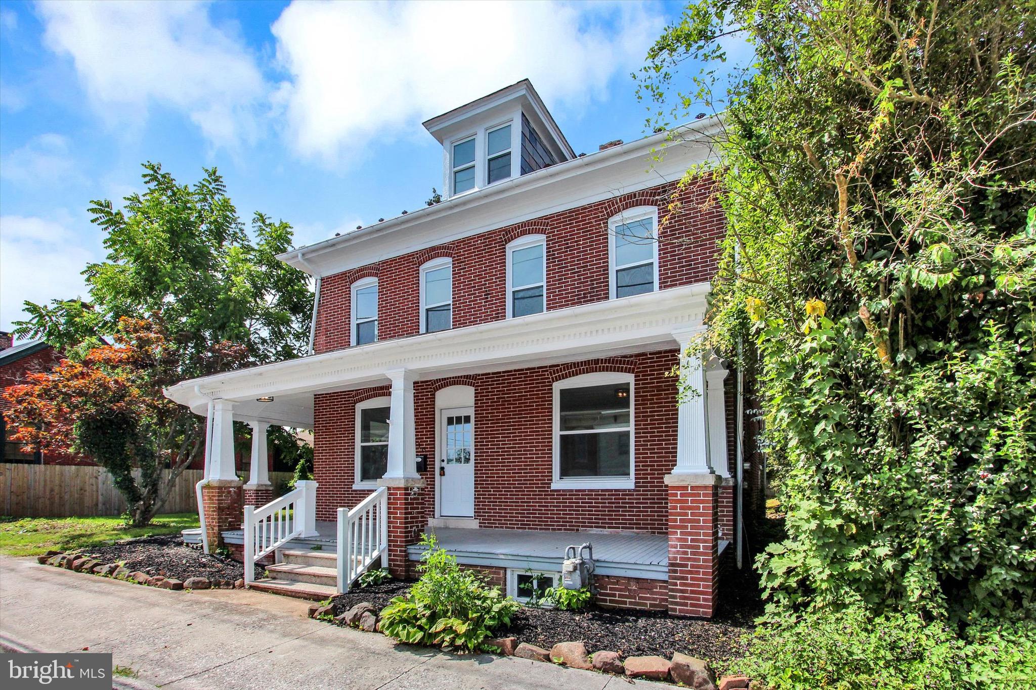 Welcome to this beautifully remodeled brick home, perfectly situated in the heart of East Berlin. From the moment you arrive, the large wrap-around porch invites you to sit back and enjoy the charm of small town living. Inside, you’ll find a thoughtfully updated interior that blends classic character with modern convenience. The main level features a bright and functional layout, including a first-floor laundry and a stylish kitchen perfect for entertaining. Upstairs, three spacious bedrooms and two and a half updated bathrooms offer plenty of room to relax and unwind. Step outside to a huge detached garage/outbuilding, providing endless possibilities whether you need extra storage, a workshop, or space for hobbies.
Don’t miss this rare opportunity to own a move-in ready home with timeless appeal and all the modern upgrades you’ve been looking for!