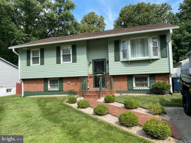 The home was recently appraised for 390k FHA! The buyer having problems closing. Your choice is $10,000 in closing costs or reduces the list price by 10k! The pride of homeownership!! Grand split foyer with all of the bells and whistles. The home has been freshly painted throughout, with hardwood flooring on the entire upper level. The owner's suite has a bathroom you can enter from the bedroom and the hallway, along with two lovely-sized bedrooms with nice closets. The kitchen has stainless steel appliances with a built-in microwave and granite countertops. Alongside the kitchen are the dining area and a living room. The lower level features a large bedroom, furnace room, and a large rec room with an electric standing fireplace and a full bathroom with shower. The beautiful backyard features a large deck that walks out to a beautiful large fenced-in yard, all of which are maintenance-free. Please follow COVID guidelines, no mask, no entry. Use hand sanitizer and wear show coverings. Easy to show Online showing time.