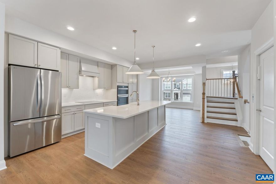 Quick Move-In, Luxury Elevator Townhome with Mountain Views! This End Unit Towne comes with 4 Finished Floors, Residential Elevator servicing all 4 Floors and Rooftop Veranda. This wide townhome is designed to capture the beautiful Crozet views while incorporating thoughtful, included features and spacious living spaces throughout. Starting with a 2-Car Garage, finished bedroom and full bath on the lower level, you can head to the open 2nd Level for entertaining in your Kitchen, Great Room with Fireplace, Dining Room & spacious Trex Screened-In Deck (plus a half bath!). The 3rd Level is home to the private Owner's Suite & Bath, second bedroom, full bath and Laundry Room. The 4th Level comes with a finished Rec Room, full bath, Private Study & show-stopping Veranda. Located in amenity-filled Old Trail, you can enjoy all that this neighborhood & Crozet have to offer! This Townhome has February 2025 Closing.,Granite Counter,Fireplace in Great Room