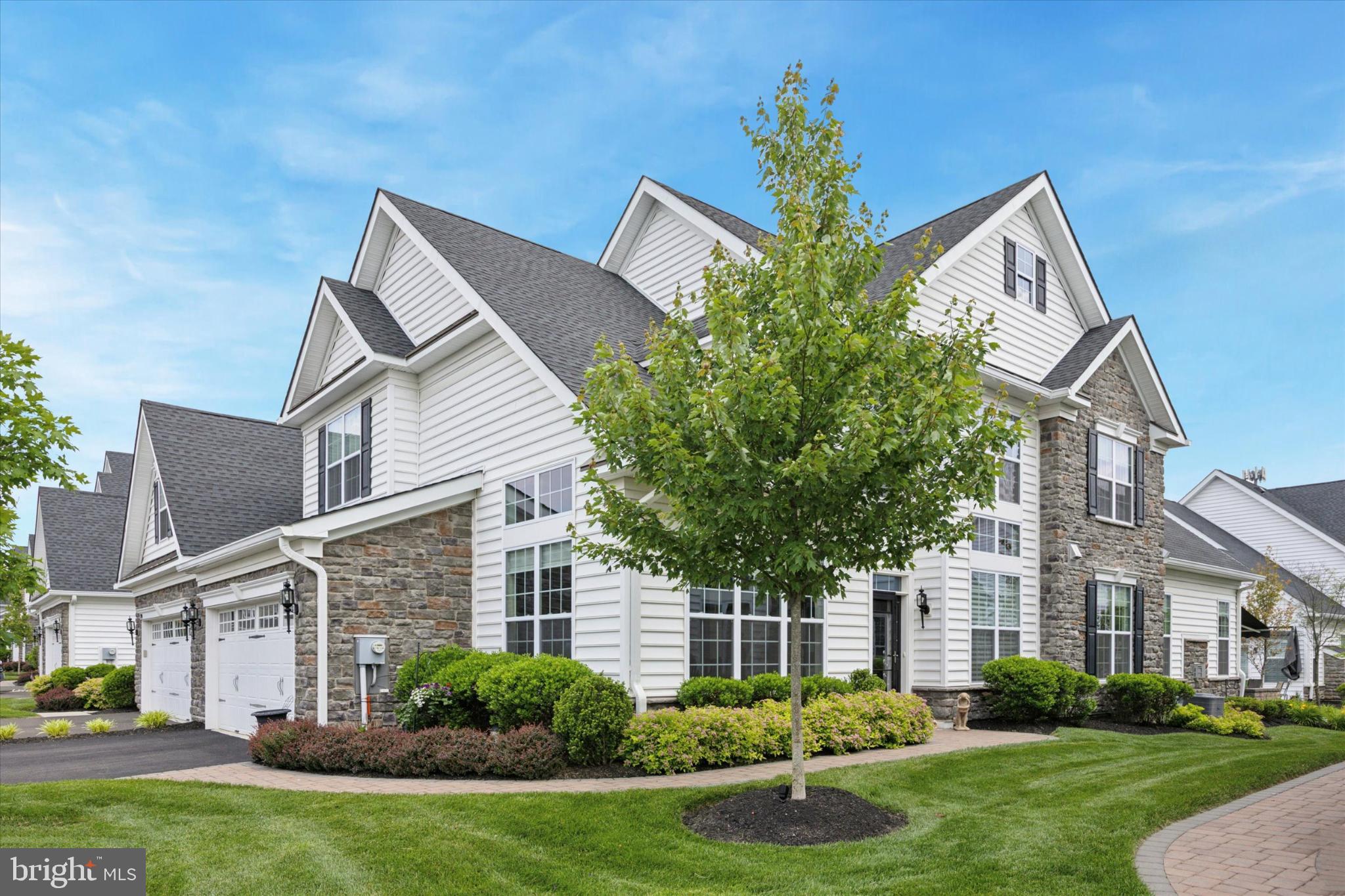 Discover this bright end-of-row, 3 bedroom townhouse in Regency at Yardley, a sought-after 55+ community, built in 2018. The main level is designed for easy living with an open layout that includes an amazing dining room with high ceilings, a cozy family room off the kitchen with gas fireplace, and the primary bedroom with a private ensuite bath. The kitchen features gorgeous countertops, stainless steel appliances, and an inviting breakfast area. Step out to the patio for a quiet cup of coffee or evening grilling. Upstairs, a huge loft offers flexible space for an office, den, or hobby area, and two additional bedrooms share a full bath, perfect for overnight guests. A main-level powder room rounds out the 2.5-bath, three-bedroom plan. Life in Yardley is hard to beat, classic small-town charm with everyday convenience. You’re close to shops, cafés, parks, and the riverfront, plus nearby trains and major routes make commuting and day trips straightforward. Community amenities include a swimming pool, fitness center, and clubhouse, adding comfort, connection, and low-maintenance living to the mix. This is a practical, move-in-ready home in a prime location.