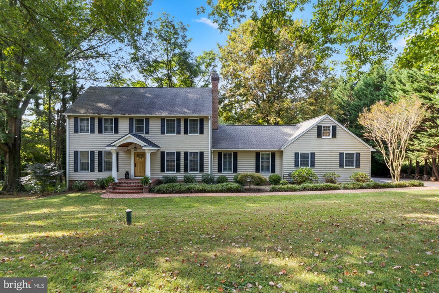 Check out the virtual tour! Welcome to this stunning 6-bedroom, 2.5-bath home in the highly desirable Ravenhurst neighborhood. Fully renovated inside and out, this residence blends modern updates with timeless charm, offering an abundance of space for both everyday living and entertaining.

Step inside to find a spectacular family room with a vaulted ceiling, walls of windows, and a cozy wood-burning fireplace. The open layout flows seamlessly into the living room and out to a covered porch with a mounted TV—perfect for cheering on the O’s or Ravens. The porch overlooks nearly an acre of flat, usable yard space, providing the ideal setting for gatherings, play, or relaxation.

The gourmet eat-in kitchen features stainless steel appliances and ample cabinetry, while a formal dining room and convenient first-floor laundry with half bath complete the main level.

Upstairs, the primary suite offers an en suite bath and generous closet space. Three additional bedrooms and a full bath round out the second level, with two more bedrooms on the third floor—plenty of room for family, guests, or a home office.

The fully finished walkout basement is filled with natural light and provides an incredible rec room space to fit your lifestyle. A two-car garage adds convenience and storage.

Lovingly maintained and move-in ready, this home offers the best of Ravenhurst living with its thoughtful updates, spacious layout, and unbeatable location.

Come see it today—you’re sure to fall in love!