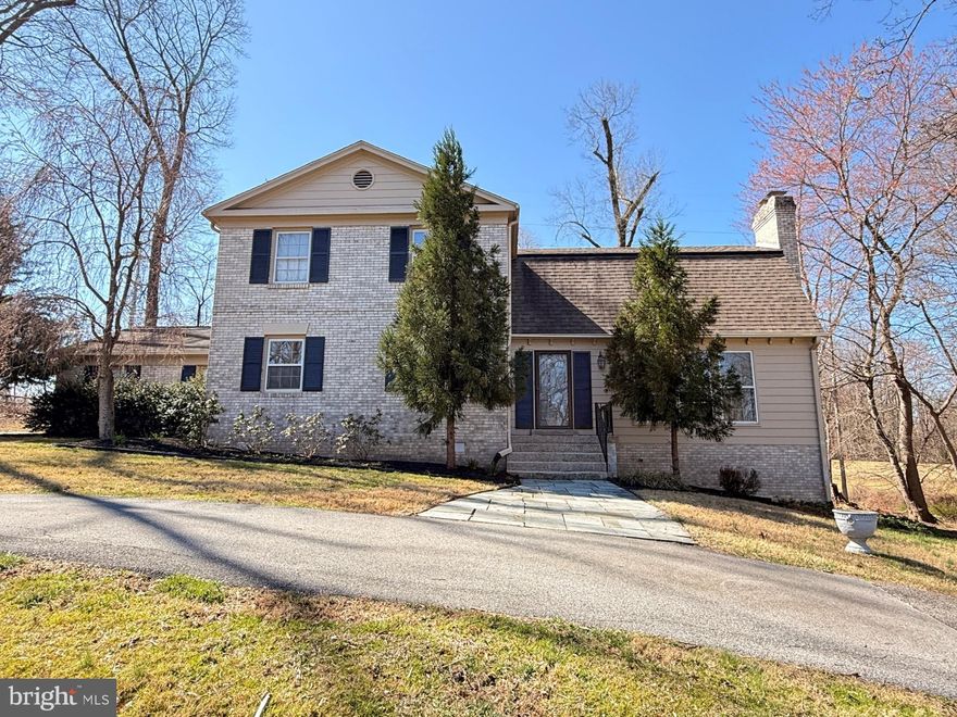 Welcome to the stately Darnestown community of Ancient Oak. This beautiful 4‑bedroom, 4‑bath brick Colonial offers over 3,400 square feet of living space and sits on more than ¾ of an acre of private, wooded land.  The home features two fireplaces, a main‑level private office ideal for remote work, and a two‑car garage with a horseshoe driveway, providing easy access and ample parking for guests. The refreshed kitchen opens to a sunny breakfast room and showcases new stainless steel appliances, a new backsplash, and classic wood cabinetry.  Additional highlights include a mudroom and laundry room conveniently located off the garage, creating the perfect landing zone for shoes, coats, and everyday essentials. The fully finished lower level offers incredible flexibility with a recreation area, a bonus/flex room, a full bath, and generous storage—ready to adapt to your lifestyle.  A standout feature of this home is its peaceful, secluded setting. Enjoy the sounds of every season while relaxing on the patio in your private backyard, now regenerating after daily work and school routines.  Ideally located close to shopping, dining, and Kentlands, with easy access to the Seneca Ridge and Greenway Trails,  and major commuter routes, this home offers the perfect balance of privacy and convenience.
