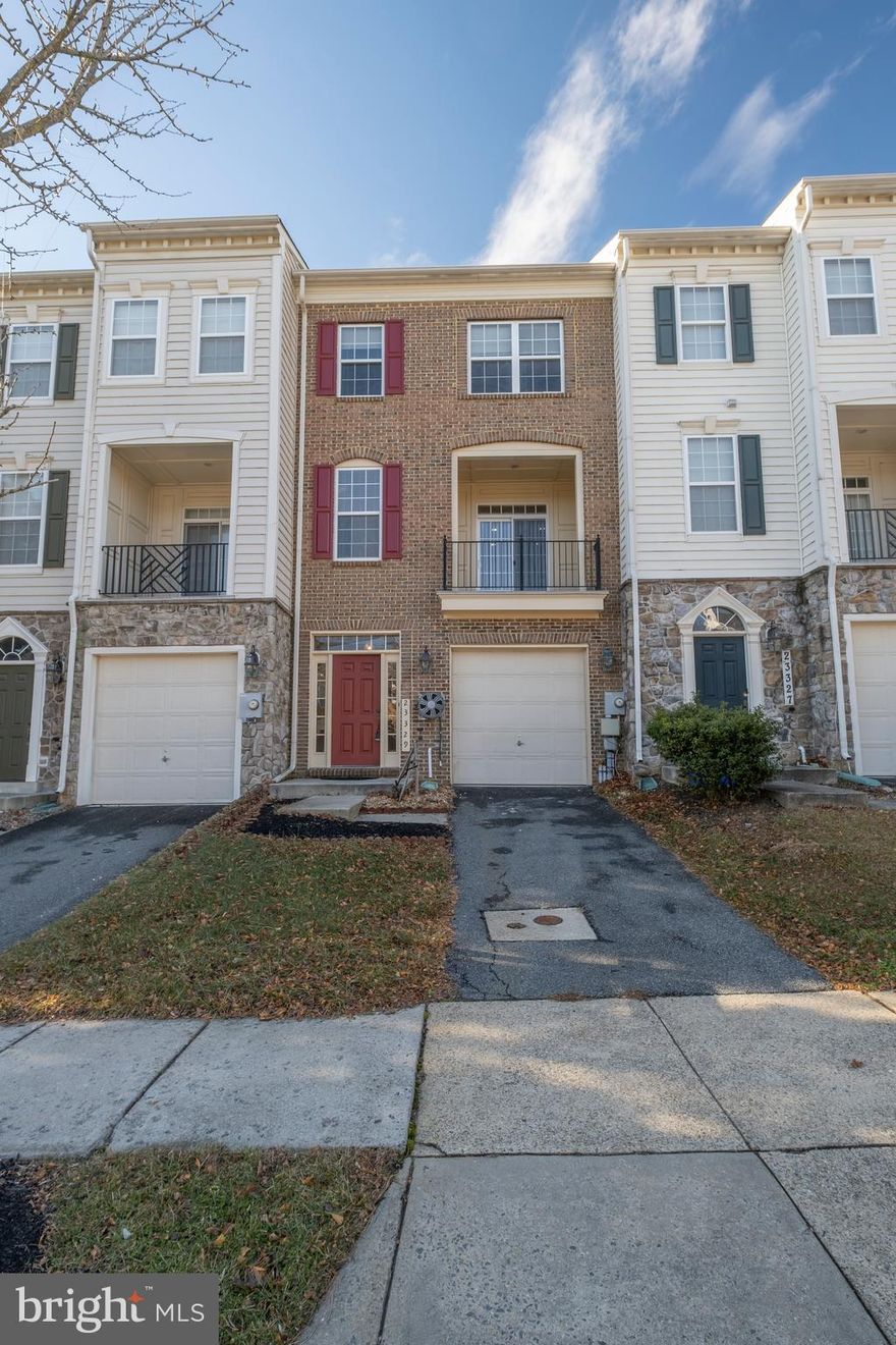 Well maintained town house with 1-car garage, 3 BR, 2/2 Bath. Open floor plan. Entrance to first ground level with recreation room and half bath and garage. NEW CARPET. Convenient to shopping center and highway.  Wood floor on recreation room.