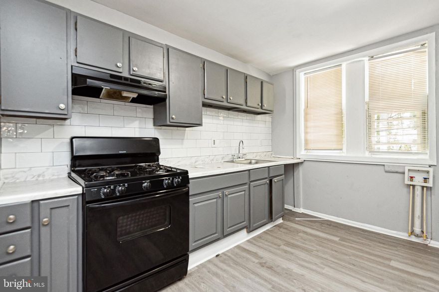 3 Bed 1 Bath Completely renovated from top to bottom which includes installation of brand-new roof!!! This gem not only has exposed brick but also a stunning and newly installed bathroom and kitchen. If that wasn't enough home has also been freshly painted with NEW carpet installed throughout. Home is being sold As Is, but Owner has prepared it nicely to market. COMPLETE TURNKEY PROPERTY. Recent kitchen upgrades include cabinets and flooring. Appliances are conveying in working order and As Is condition washer/dryer hook-ups already installed. Fenced rear yard. Gas heat. Street parking. HUGE Rental Opportunity $$$$$. Affordable $$$$. Run the numbers and YOU will see for yourself the ROI percentage is VERY advantageous. Call Song Hong for a grant for up to 70k.