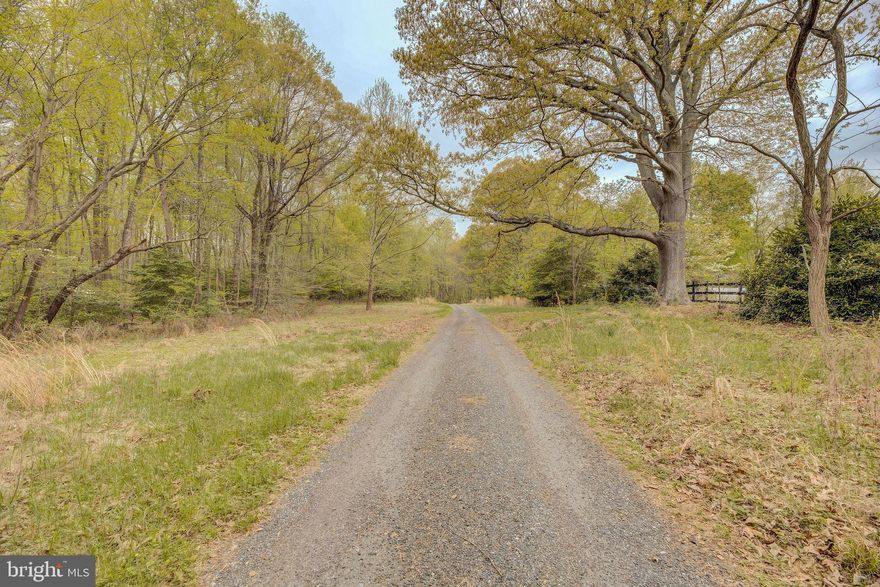 Looking for the perfect place to build your dream home? This 10+ acre parcel of land is in the final stages of permitting and has a valid perc approval, making it an excellent opportunity to create the home you have always wanted. The property is already approved for a 5,000+ square foot home, but plans can be modified to fit your specific needs and preferences. Whether you are looking for a peaceful retreat or a place to begin your next chapter, this land has the potential to be your ideal setting. Located in a beautiful area, this property offers scenic views and plenty of room to enjoy the outdoors. With its excellent location, you will be close to all the amenities you need while still being able to enjoy the tranquility of country living.  Do not miss out on this incredible opportunity to own a piece of paradise.  Start planning your dream home! No Covenants.