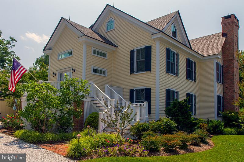 Design/Build by Crabb & Co. LLC. This 3 BR, 2.5 bath w/custom finishes in every room....An elegant entry, paneled rooms, custom moldings, cherry floors, tile bathrooms, porches, gourmet kitchen & views of Town Creek. 40 x 20 workshop/studio w/half bath. Lovely gardens, patio & off street parking. The fit & finishes feel like a historic home.