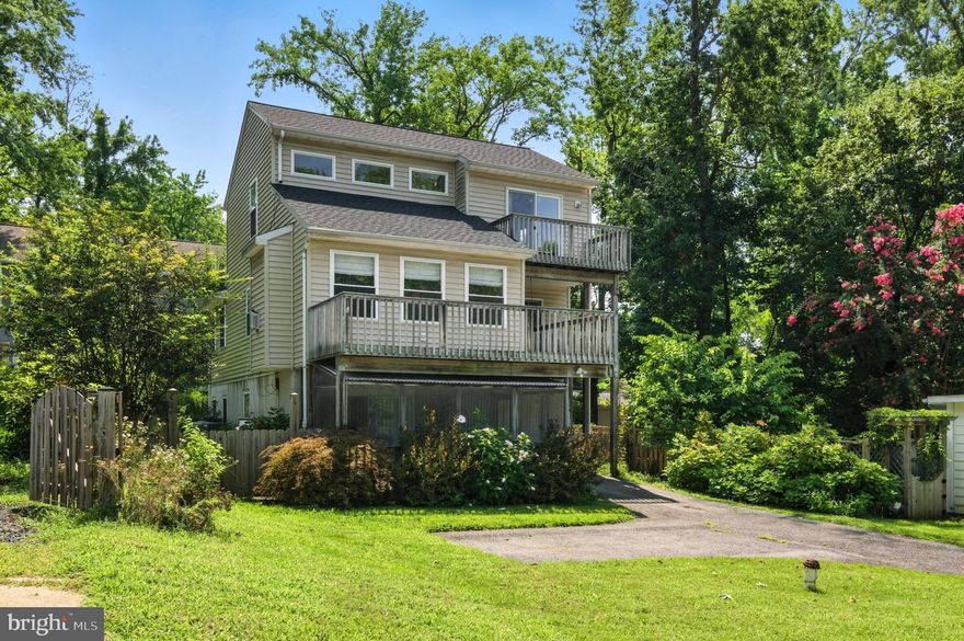 Welcome to Bay Highlands in Annapolis! This open, light-filled home is spacious and inviting. You'll love the airy living room with high ceilings and skylights, as well as a gas fireplace and wrap-around balcony (there's even a porch swing)! The primary suite includes a private balcony and ensuite bath as well as a fabulous walk-in closet. Use the loft as a 4th bedroom, office, or game room. A well-appointed kitchen includes stainless appliances, and plenty of counter and storage space; adjoining the kitchen is convenient upper-level laundry. The entry level of this contemporary home includes two large recreation areas; the back room could also be used as a bedroom and has walkout backyard access as well as a third full bathroom. The peaceful screened in porch is perfect for crab feasts, game nights or a cozy afternoon reading spot. With garage parking and additional driveway space, there's plenty of room for vehicles as well as storage. The community of Bay Highlands has access to a dock and boat ramp, and landlord is happy to arrange for boat ramp access. Pets considered on a case-by-case basis! Please note: minimum 650 credit score and qualifying income required.