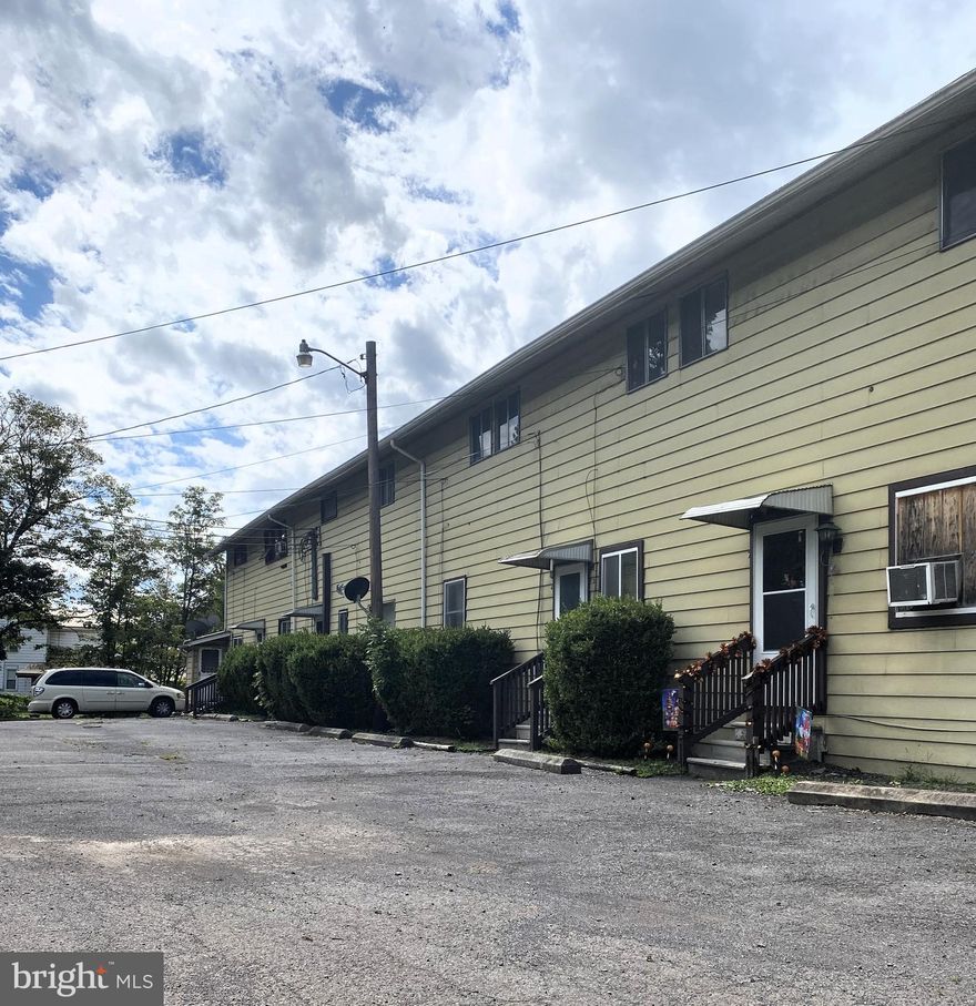 Attention Investors! Check out this 7-unit Apartment Building with potential for great rental history.  Building is being sold *AS IS* and most apartments are in need of rehabilitation.  The building features two-1Bed/1Bath Apartments, four-2Bed/1Bath, and one 3-Bed/1Bath. Three of the 7 units are currently rented bringing in $1,500 a month--the owner lives in one of the apartments. Projected rent at the present rate on the vacant apartments is $525 per month totaling over $2,625 in monthly income (including current owner)! Possible projected rent would be $550 for the 1 bed apartments and $650 for the 2-bed apartments, and $750 for the 3-bed apartment.  Total potential income would be $4,450 or $53,400 gross income yearly.  Each apartment is separately metered for electric and heated with electric baseboard with the exception of apartment 7.  Apartment 7 is gas heated and has had some updates.  Water, sewer, & trash is an owner expense.  Each unit has washer/dryer hookups.  Unit 1 is ready to rent.  Unit 5 is owner occupied and in need of updates.  Units 6 & 7 are rented.   Units 2, 3, and 4 are in need of trash removal and in need of rehabilitation.  The building is in the floodplain.  If financing is needed, Erie estimated $8,000/year flood insurance.