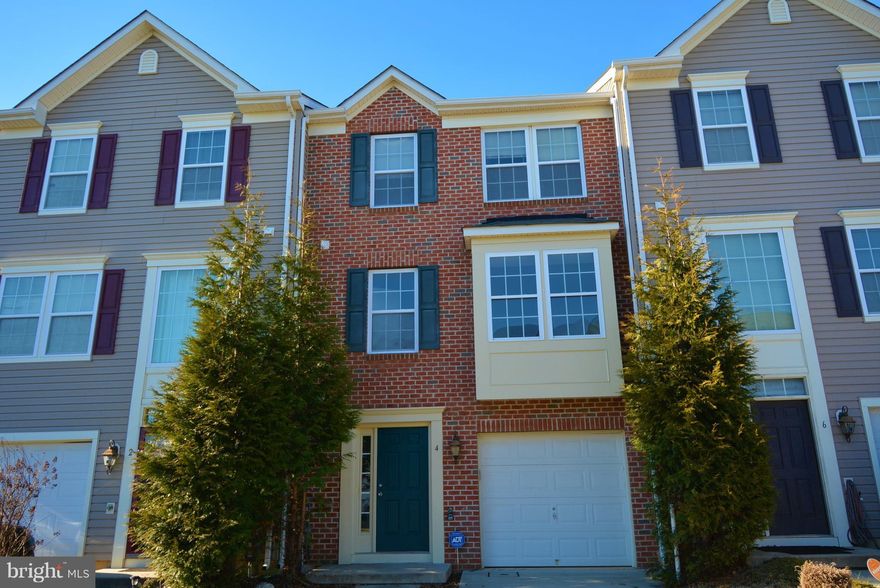 motivated seller!!! Bring YOUR OFFER!!! Like new townhome with 3 beds, 2 full & 2 half baths! New carpet, kitchen back splash and new appliance/ stainless steel appliances.   A large center island kitchen, ample cabinets, gas stove, dining & living room. Master bedroom walk-in closet. luxury master bath plus 2 more bedrooms & full bath upstairs. Walk-in basement/family room includes a full washer/dryer. 5 minutes away from shopping center. Easy access to I-695 and I-795.