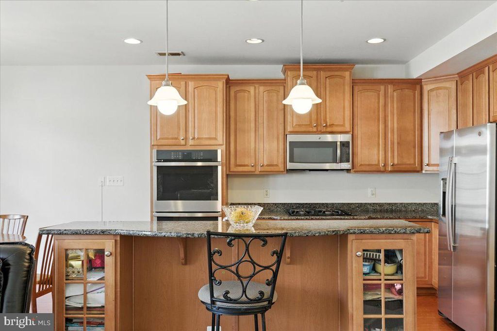 Photo of 5707 Callcott Way #H, ALEXANDRIA, VA 22312 (MLS # VAFX2275964)