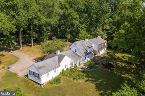 Set on 2.2 private, wooded acres in desirable Newtown Square, this 5,400+ sq ft home offers endless possibilities. Featuring 5 bedrooms, 2 full and 2 half baths, multiple fireplaces, and charming details like arched bay windows and hardwood floors, the property can be renovated to restore its classic elegance or torn down to build your custom new-construction dream home. Conveniently located near top schools, major routes, shopping, dining, and the Springton Reservoir, this is a rare opportunity to create the home you’ve always envisioned in a premier location.