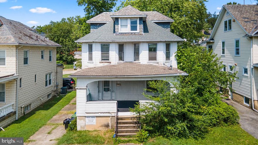 Welcome to this charming property, brimming with potential and waiting for your personal touch! With a bit of TLC, this house can be transformed into a beautiful home.
This property features a large covered front porch with a stained glass transom entryway, welcoming you into a spacious foyer also adorned with beautiful stained glass windows. French doors lead to the family room, creating an inviting space for gatherings.
The first floor offers the convenience of an owner's suite and a full bathroom, making single-level living a breeze. The kitchen provides access to a rear porch with stairs leading to the back yard, perfect for outdoor entertaining.
The second floor boasts a second kitchen, offering flexibility and potential for various uses. The large finished open concept third level can be adapted to suit any need, providing ample space for your creativity.
This home is a fantastic opportunity to create the living space of your dreams. Don't miss out on the chance to bring this gem back to its full glory!