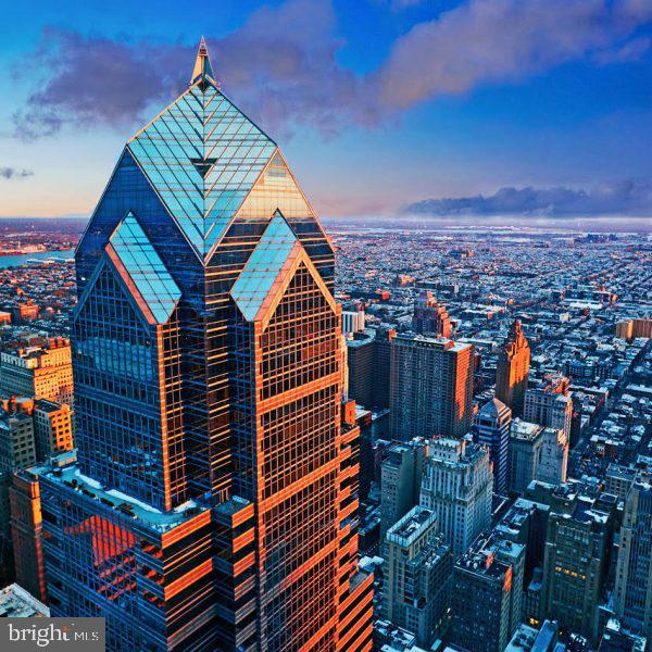 Skyline Sophistication at Two Liberty Place!
Perched high above the vibrant streets of Center City Philadelphia, Residence 5303 at the iconic Two Liberty Place offers a lifestyle defined by unparalleled luxury, breathtaking views, and sophisticated design. This two-bedroom, two-bath residence is situated on the exclusive Skyline Floor, where floor-to-ceiling windows frame panoramic views of the city’s ever-evolving skyline, the Delaware River, and beyond, AND, has incredible views of the entire square at Rittenhouse! Breathtaking!!!
Crafted by the esteemed Murphy/Jahn Architects and designed by Helmut Jahn, Two Liberty Place stands as an architectural masterpiece—a glass-and-steel beacon soaring 848 feet above the city, making it the third-tallest building in Philadelphia and the 33rd tallest in the United States. Completed in 1990 as the sister tower to One Liberty Place, this landmark skyscraper underwent an extraordinary transformation when the top ten floors were reimagined into ultra-luxury residences, delivering an elevated standard of living unlike anything else in the city. Skyline Floor Views are expansive! Floor-to-ceiling windows bathe the space in natural light while offering breathtaking, unobstructed cityscapes. The Modern Gourmet Kitchen is Outfitted with top-of-the-line appliances, sleek cabinetry, and custom countertops—perfect for everyday cooking or entertaining.
Primary Suite is a serene retreat with spa-inspired bathroom, featuring luxurious finishes, a soaking tub, and a glass-enclosed shower. Some Refined Details include Hardwood floors, designer lighting, and an open-concept design that seamlessly merges contemporary aesthetics with timeless elegance. Residents of Two Liberty Place enjoy access to a STUNNING newly reimagined and impeccably designed amenities floor—a full-floor oasis of comfort, convenience, and luxury:
State-of-the-Art Fitness Center: With skyline views to inspire every workout.
Indoor Infinity Pool: A tranquil escape with vistas stretching across the city.
Club Lounge & Entertainment Spaces: Perfect for hosting intimate gatherings or simply unwinding in style.
Private Boardroom & Business Center: Catering to both work-from-home professionals and executive needs. On the 3rd floor is also another gym offering workout classes etc that you can join (should you wish to do classes etc) for the low cost of $20 per month (YES.... $20 dollars)
Concierge & Valet Services: Enjoy white-glove service and 24/7 security for effortless city living. You can have as many cars as you wish..... Also, you can either valet your car OR park yourself! All residents have access to the house car (a large black SUV with charming plate ‘2 Liberty’) to take them around the city (radius includes 30th street station, very convenient!!!
Nestled in Center City’s bustling core, Two Liberty Place places you at the epicenter of Philadelphia’s cultural, culinary, and commercial scene. Step outside to enjoy world-renowned restaurants, high-end shopping at The Shops at Liberty Place, Rittenhouse Square’s boutiques and cafes, and easy access to arts venues like the Kimmel Center and the Barnes Foundation.
Residence 5303 at Two Liberty Place represents more than just a home—it is a statement of architectural excellence, timeless design, and urban sophistication. For those seeking the pinnacle of Philadelphia luxury living, this Skyline Floor residence offers a once-in-a-lifetime opportunity to reside in one of the city’s most prestigious addresses.
*******important to note: HVAC is included in the condo fees (specifically, it is $13.15 per month as of 1/1/25) Electric generally runs between $7/$8 per month to $12/$13 in winter. Just a fractional additional cost. The lockers are on the 40th floor, valued at $5000. Would be included in the price.*******
And, of course, the building as a huge parking garage!!
Schedule your private tour today and experience the elevated lifestyle that awa