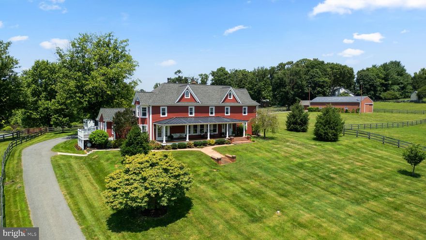 This is the ONE. The entire package. Welcome to Compass Hill Farm, an exceptional equestrian estate located in the heart of Howard County. This 5-bed, 3.5 bath, 4224 sq ft home sits on 10.3 acres of lush pastures, landscaped grounds, and natural beauty. A true turn-key equestrian facility that reflects thoughtful design, care, and maintenance. The property is zoned for blue ribbon schools and within easy access of dining, shopping, and entertainment. All this within 45 min to DC, 30-minutes to Baltimore and 15-minutes to Columbia.

The expansive, gorgeous farmhouse reflects rustic authenticity in an atmosphere of refined living. The home is an entertainer's delight, with a large open-concept kitchen and floor plan that centers around the home's showpiece mid-19th century log cabin "heart." Multiple French doors, custom millwork, and over 40 large windows fill the home with light and allow 360-degree views of the property. Take in the seasons from the expansive front porch and watch your horses graze, backlit by stunning sunrises and sunsets. Set back from the road, and buffered by an idyllic meandering stream and riparian habitat, the home and farm offer a refuge of beauty and peace for both horse and human.

The discerning equestrian enthusiast will enjoy a 2013 Mennonite-built 5-stall center-aisle carriage barn with heated, custom-built tack room, hot/cold wash rack, large hay loft, rubber bone-paver aisle, and farm-grade, ceiling-mounted fans in each stall. Three-board fenced pastures are optimized for all-season sustainability with upgraded heavy-use areas and heated automatic waterers. A state-of-the-art, all-weather, 100’ x 150' laser-graded riding arena with a bluestone base topped by premium rubber/sand arena footing and a bridle path allows for versatile and year-round schooling. A 40' x 60" pole barn with water and electric offers versatile options for leisure or business. Surrounded by renowned competition venues, world-class clinicians and trainers, and thriving local US Pony Clubs, this estate offers it all. Experience the beauty and serenity of this special estate today.