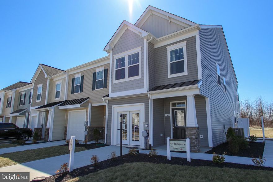 Convenient commuter location, Just off I-81 Exit 23, near shopping and close to the MD state line, This interior unit town offers a touch of luxury in look, with it's partial stone work and pillar column facade, upgraded stainless steel and ALT style island kitchen with stylish pendant lighting. It's double driveway, single car garage, 3 ample sized bedrooms, 2.5 full baths with concrete patio and attached shed in a maintenance free community.  ACTUAL HOME MAY DIFFER FROM PHOTOS*