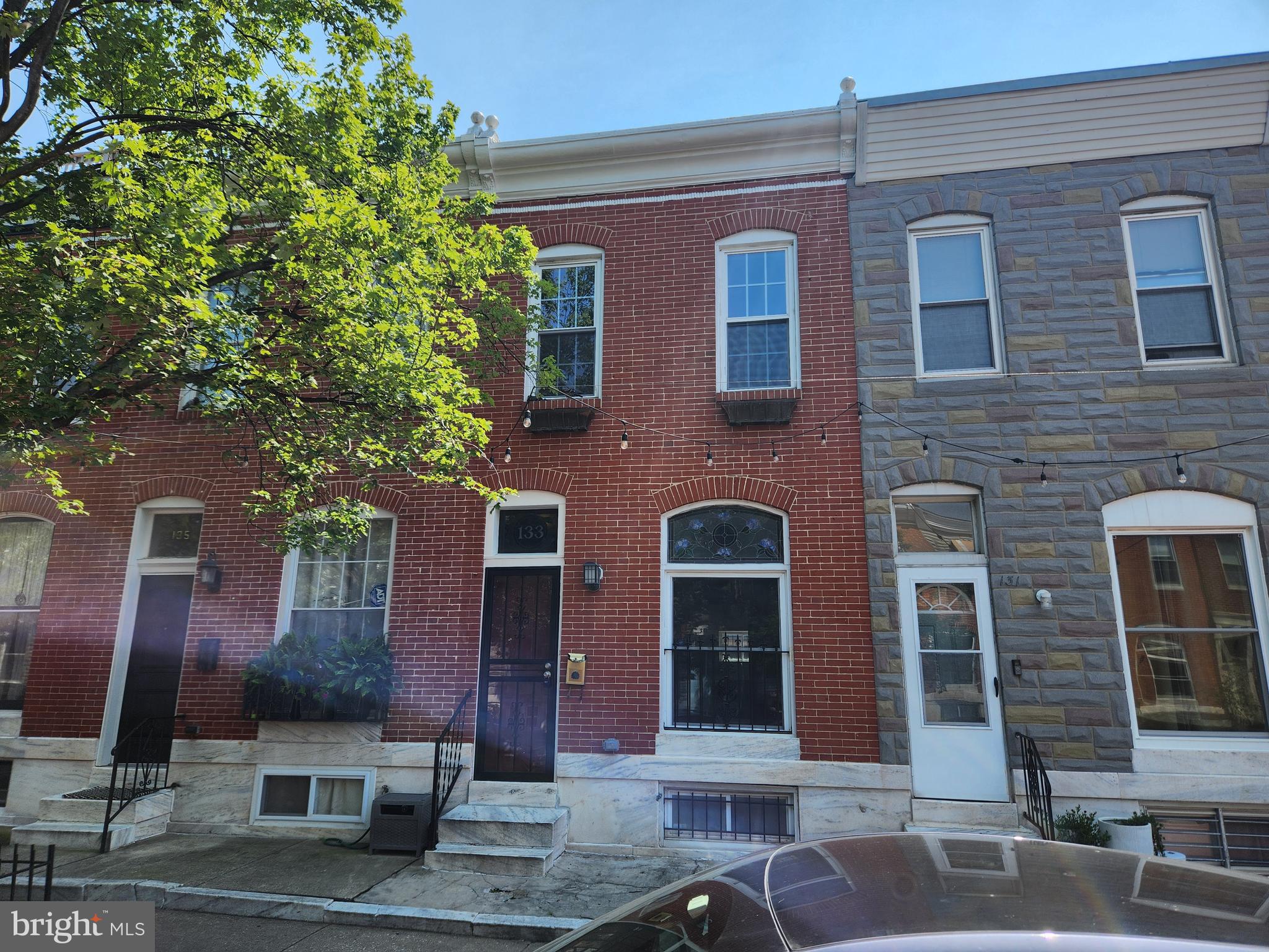 Recently updated Townhome residence located in the Patterson Park Neighborhood. This home offers 3 finished level. Main level offers a living room, dining area and updated eat-in-kitchen w/ white shaker cabinets, granite counters, SS appliances and LVT flooring. The upper level offers 2 bedrooms and 2 full bathrooms. Primary bedroom w/ dual closets and full bathroom. Partially finished lower lever w/ possible 3rd bedroom, half- bath and separate laundry area. New Carpet, Paint & HVAC. Approx. 3 blocks from Patterson Park. ** THIS PROPERTY IS NOT FOR RENT. ANY RENTAL LISTINGS ARE FRAUD**