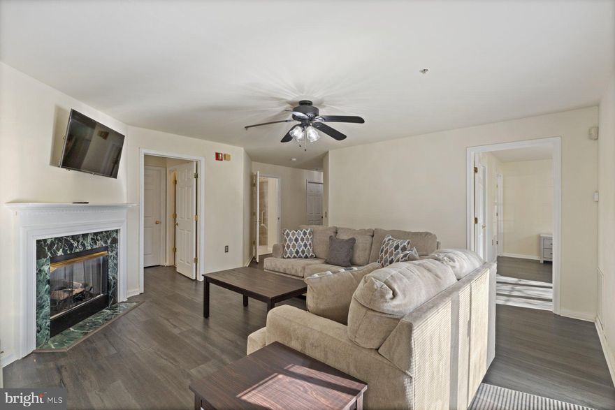 Discover comfortable, convenient living in this bright and spacious 2-bedroom, 2-bath condo with 1,208 sq. ft. of well-designed space, this home features LVP flooring, a private patio, and an open layout. The kitchen includes stainless steel appliances, and the in-unit laundry room offers additional storage. The primary bedroom has a generous walk-in closet and en-suite bathroom, while the second bedroom connects to a bathroom with a walk-in shower. The home is currently furnished with two TVs, two queen beds, a sofa, dining table, and coffee table, which is available for tenant use at no cost or removable before move-in. Subtle accessibility features can remain or be removed upon request. Enjoy unbeatable convenience with shops, restaurants, Starbucks, and The Fresh Market just a few minutes away, plus quick access to Giant, Safeway, Wegmans, the Quarry Lake walking loop, local hospitals, and major highways including I-695, I-83, and I-795. Water is included, no pets allowed, and one months rent is required as the security deposit. Minimum credit score required: 650+. Applicants must apply through RentSpree: https://apply.link/6qAMOgg