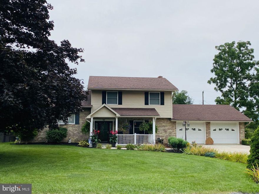 THIS IS THE ONE YOU HAVE BEEN WAITING FOR IN BRADDOCK ESTATES!! Close to I-68, this meticulously cared for home with top-grade updates including new bamboo floors is sure to please your eye. This home has been completely renovated inside and out. This is an energy efficient home featuring a Bosch natural gas/hot water furnace (98% efficient) averaging $700/year which heats home, garage, and hot water. The back of the home boasts 2 decks. The 10x16 upper deck from the master bedroom offers quite the view! The 20x20 lower deck from the open-space living/dining/kitchen area has an 8-person Hot Springs hot tub to enjoy. The outside of both the front and rear of the home have water and electric available. The shed can hold all your outside toys or tools for storage with an automatic garage door. Enter through the heated garage with fresh epoxy paint to avoid tracking any debris inside before entering the mud room area. A full bath is located off the mud room. From the beautiful front entrance, you enter into a tiled foyer that leads to a large family room. Just wait until you see the gorgeous and real fireplace. Within the family room, there is a large eight foot sliding door that leads to an outside patio area of the back yard that also has been newly epoxy painted. Moving to the next level, this open-space allows the chef of the home to talk with guests while cooking and entertaining in the newly renovated kitchen with beautiful quartz countertops. Appliances are less than two years old. The dishwasher has a separate drain. The Frigidaire stove with five burners/grill and oven with bake, convection, broil, and air fry settings. Floor to ceiling shaker style kitchen cabinets boasting ample storage with soft close deep drawers, bilateral lazy suzans and dual pantries surrounding the refrigerator. Looking for even more storage space? This home has closets in each bedroom and throughout the house. There is also a walk-in closet and shelving in the newly carpeted basement. Laundry hook-ups are located in the basement. New horizontal stair handrails lead you to the next level of the house. This level includes 3 bedrooms and 2 baths. What are you waiting for? Call me or your agent to make an appointment. Let's get started on making this your forever home!