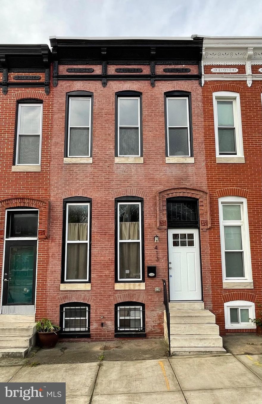 Located in the northeast corner of the Station North Arts & Entertainment is its residential community, Greenmount West. 413 E. North Ave offers both a convenient location and recent upgrades for maximum comfort. The main level's open floor plan provides flexibility for living, working and entertaining. The kitchen offers stainless appliances including a wine cooler, quartz countertops and plenty of cabinet space. The upper level features 3 bedrooms including a primary bedroom with ensuite bath, a hall bath and laundry. Finished lower lever has potential for exercise room or home office. Directly behind the home is a peaceful pocket park which the community will soon be enhancing with native species. The OR-1 zoning lends itself well to a home-based business. Convenient to Penn Station, University of Baltimore, MICA, Metro Gallery, Charles Theatre, Open Works, Station North Tool Library, restaurants, galleries, cafes and music venues.
