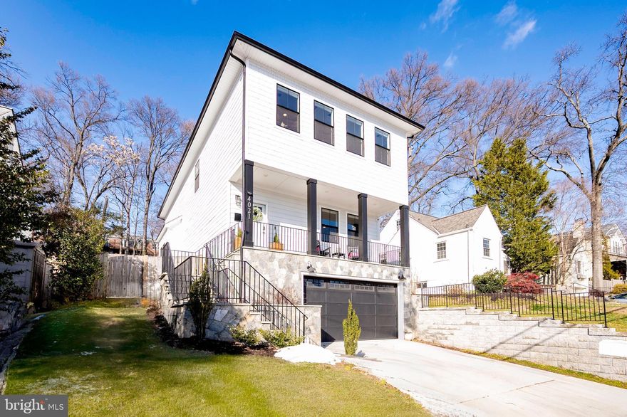 Discover the exquisite charm of 4021 19th St S, Arlington, VA—a thoughtfully designed 5-bedroom, 4.5-bathroom home that epitomizes modern luxury and convenience. Nestled on a professionally landscaped 10,000+ square foot lot, this residence boasts over 3,450 square feet of elegant living space, including a two-car side garage and a stunning blend of high-end finishes and functional design. The grand foyer welcomes you with soaring 9-foot ceilings, engineered hardwood flooring, and an open floor plan ideal for entertaining. The chef’s kitchen is a masterpiece, featuring top-of-the-line Bosch appliances, quartz countertops, an oversized island, soft-close cabinetry, a wine cooler, and a hand-cut marble backsplash. The family room, complete with a sleek fireplace and shiplap feature wall, flows effortlessly into the dining area. Additional highlights on the main level include a private office and modern black custom windows that flood the space with natural light. Upstairs, the luxurious owner’s suite offers a spa-like retreat with a freestanding soaking tub, a frameless glass-enclosed shower, dual vanities, and a custom walk-in closet. Three additional spacious bedrooms, including one en-suite, and a large laundry room complete the upper level. The fully finished basement includes a dry bar, an entertainment room, and a private guest suite with an en-suite bathroom. The outdoor space is equally impressive, featuring a large stone patio with a gas connection for a BBQ or fire pit, ample flat yard space perfect for kids, and beautiful hardscaping. Smart home features include a whole-home system with CAT6 wiring, a security panel with cameras, and an electric car charger. The exterior is adorned with Hardiplank siding, a natural stone façade, and flagstone stairs leading to a charming front porch with stunning city views.Located in the heart of South Arlington, this home is just minutes from Shirlington’s vibrant shops, restaurants, theaters, and parks, with easy access to DC, The Pentagon, Tysons, and local schools. Combining sophisticated design, modern amenities, and a prime location, this home is a true hidden gem.