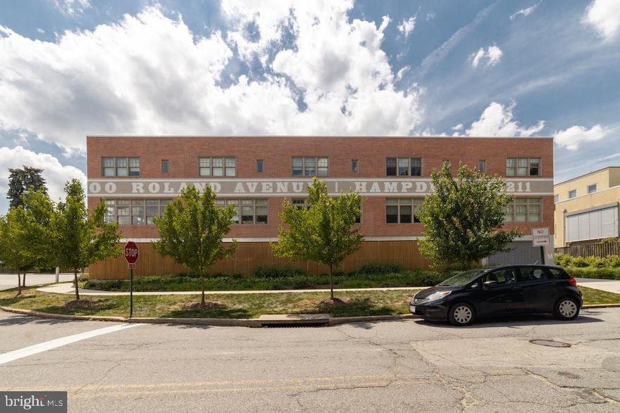 Hampden has a landmark building two blocks below The Avenue. The Courtyard at 3400 Roland Ave offers stylish two-story townhouse-style apartments. Each unit includes two bedrooms, two full bathrooms,  garage parking and private laundry. You'll appreciate the beautiful hardwood floors, high ceilings, and tons of windows. Enjoy spacious kitchens and bathrooms appointed with contemporary finishes. Relax in the private community courtyard. Pets are allowed on a limited basis. Dogs are no longer permitted apart from service animals. Unit 1 is available September 29th. Rent includes one parking space in the garage, a second space may be available if needed.  Rental applications through RentSpree. Equal housing opportunity.