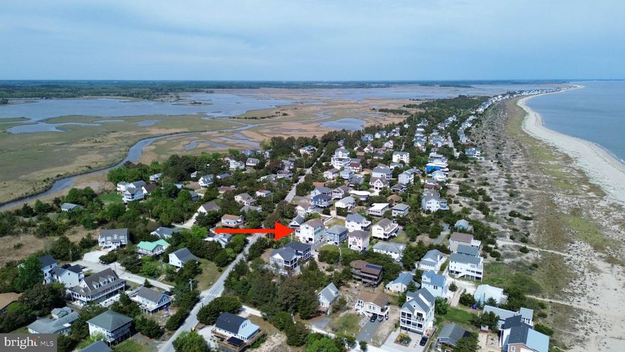 Welcome to Broadkill Beach where quiet coastal living becomes your everyday lifestyle.

Located at 14 Mississippi Avenue, this exceptional home is the personal residence of a custom builder, showcasing thoughtful design and high-end craftsmanship throughout.

Step inside to a main level designed for effortless entertaining. The spacious living room features a vaulted ceiling, a cozy fireplace flanked by custom built-ins, and an open, airy feel. The gourmet kitchen is a standout, complete with quartz countertops, a butcher block island, pot filler over the gas range, and a walk-in pantry with a dedicated coffee bar. The dining room adds warmth and character with a striking brick accent wall and built-in cabinetry. Additionally, the main level offers two generously sized bedrooms. One features a custom window bench and built-in bookshelves, complemented by two full bathrooms for added convenience.

Upstairs, the primary suite offers a private retreat with its own balcony, a luxurious ensuite bath featuring a corner soaking tub, separate shower, walk-in closet, and convenient washer and dryer. A loft overlooking the living space below leads to a rooftop deck, perfect for enjoying sweeping views of the Delaware Bay and Prime Hook National Wildlife Refuge. 

The lower level expands the home’s versatility with an oversized garage, a bonus room currently used as a game room, sauna, and wine storage. An in-law suite provides a private living area, kitchenette, full bath, and its own washer and dryer, ideal for guests or extended family.

Additional highlights include elevator access to all floors, a greenhouse, outdoor shower, hot tub, 340 AMP electrical service, LED lighting, spray foam insulation and countless custom details throughout.

Just a short walk to the beach, this home invites you to experience the peaceful charm of Broadkill Beach living every day.