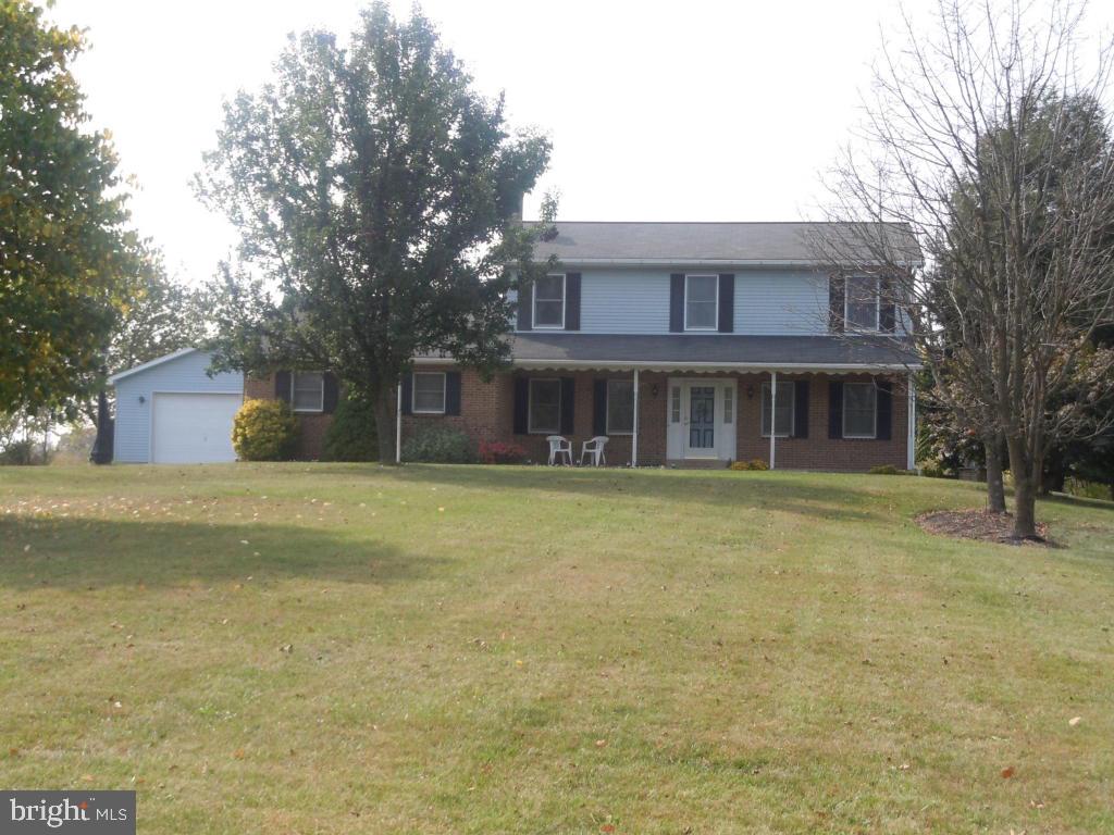 VERY WELL MAINTAINED 2 STORY IN A PRIVATE COUNTRY SETTING W/ 2 CAR ATT. GARAGE & ADDITIONAL 4 CAR ATTACHED GARAGE. HOME FEATURES A SPACIOUS UPDATED KITCHEN, FORMAL DINING AND LIVING ROOMS AS WELL AS DINING AREA AND FAMILY ROOM W/FIREPLACE. OFFICE & FULL BATH ON 1ST FL. BEAUTIFUL 4 SEASON RM W/SKYLIGHTS & TILE FLRS. THE 2ND FL FEATURES 4 BEDROOMS AND FULL BATH. ALSO FINISHED FAM RM IN BASEMENT.