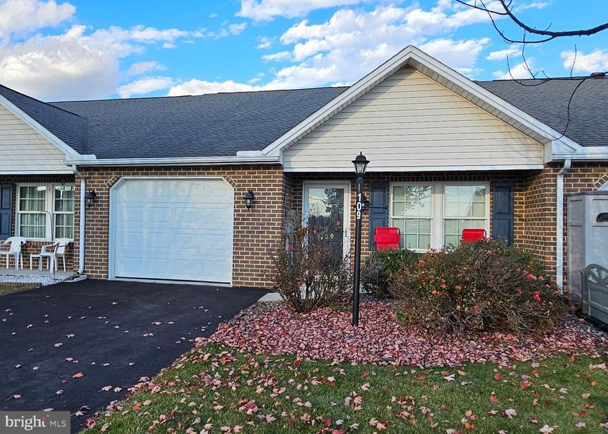 LOW MAINTENANCE LIVING... in this lovely, interior 2 bedroom, 2 bath townhome in Thornwood Village!  Spacious kitchen features pretty oak cabinets and updated flooring.   All appliances stay!  Heat Pump was replaced in 2022.  You will love the open floorplan!  Walk in shower in primary bath.   All on one level and HOA for exterior maintenance includes lawn mowing, snow removal and roof replacement! Low Utility cost, too!  (average electric is $75 per month)
The electric fireplace is not included.