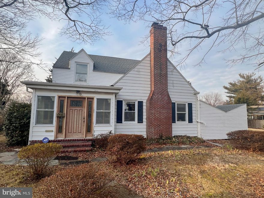 Set on a spacious double lot in the established community of Eastover Hills, this classic colonial at 529 Greenhill Rd offers timeless charm, thoughtful updates, and room to grow, all just minutes from everything Dover has to offer. Perched above street level for added presence and privacy, the home welcomes you with a picture-perfect white picket fence and inviting curb appeal that feels straight out of a storybook. Step inside to a tiled entry that transitions seamlessly into warm, original hardwood floors and a bright, welcoming interior filled with character. The main living space is both comfortable and stylish, anchored by an exposed staircase and a cozy wood-burning fireplace that naturally draws people together. Large windows invite in soft natural light, creating an airy atmosphere that feels equally suited for relaxing evenings or entertaining guests. The kitchen and dining areas flow effortlessly together, forming the true heart of the home. A generous peninsula provides plenty of prep space and casual seating, while granite tile surfaces, stainless steel appliances, and durable tile flooring blend function with modern appeal. The dining room enjoys abundant sunlight and easy access to the backyard, making indoor-outdoor gatherings a breeze. Upstairs, three well-proportioned bedrooms offer flexibility for family, guests, or a home office. The primary bedroom features hardwood floors, multiple windows, and comfortable closet space. The updated hall bath adds a sleek touch with a floating vanity, tile flooring, and a glass-enclosed shower. Downstairs, the full basement provides excellent storage and future potential, already equipped with a sump pump system and framing that makes finishing the space straightforward. Laundry is conveniently located here as well. Outside, the fully fenced yard spans nearly half an acre, offering plenty of space to play, garden, or simply unwind, yet remains easy to maintain. Last but not least, this property includes not one but two detached garages! A driveway at the rear leads to the two-car garage and just across the street is another single detached garage which is wired for electric and includes a large loft space above. With 1,804 square feet of living space, classic details, and a convenient location near shopping, dining, and major routes, this home delivers the perfect balance of character, comfort, and everyday practicality. Schedule your showing today!